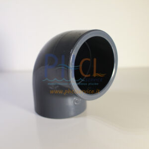 Gray PVC 90-degree elbow pipe fitting on a white surface, used in plumbing.